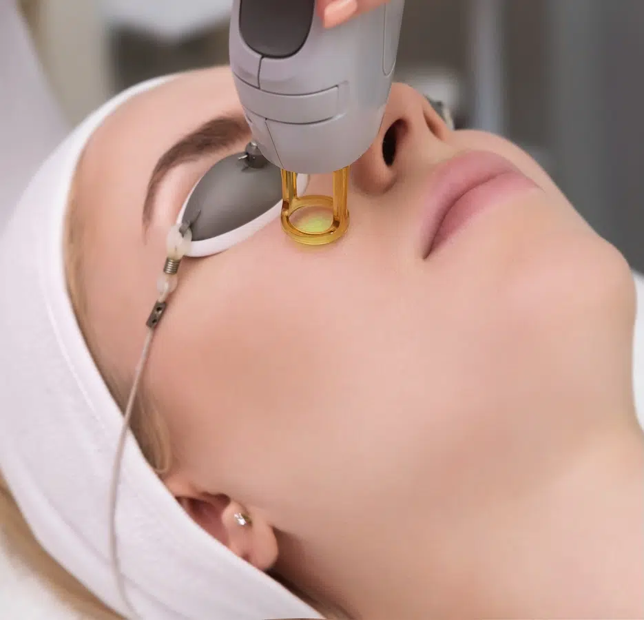 woman receiving skin tightening treatment