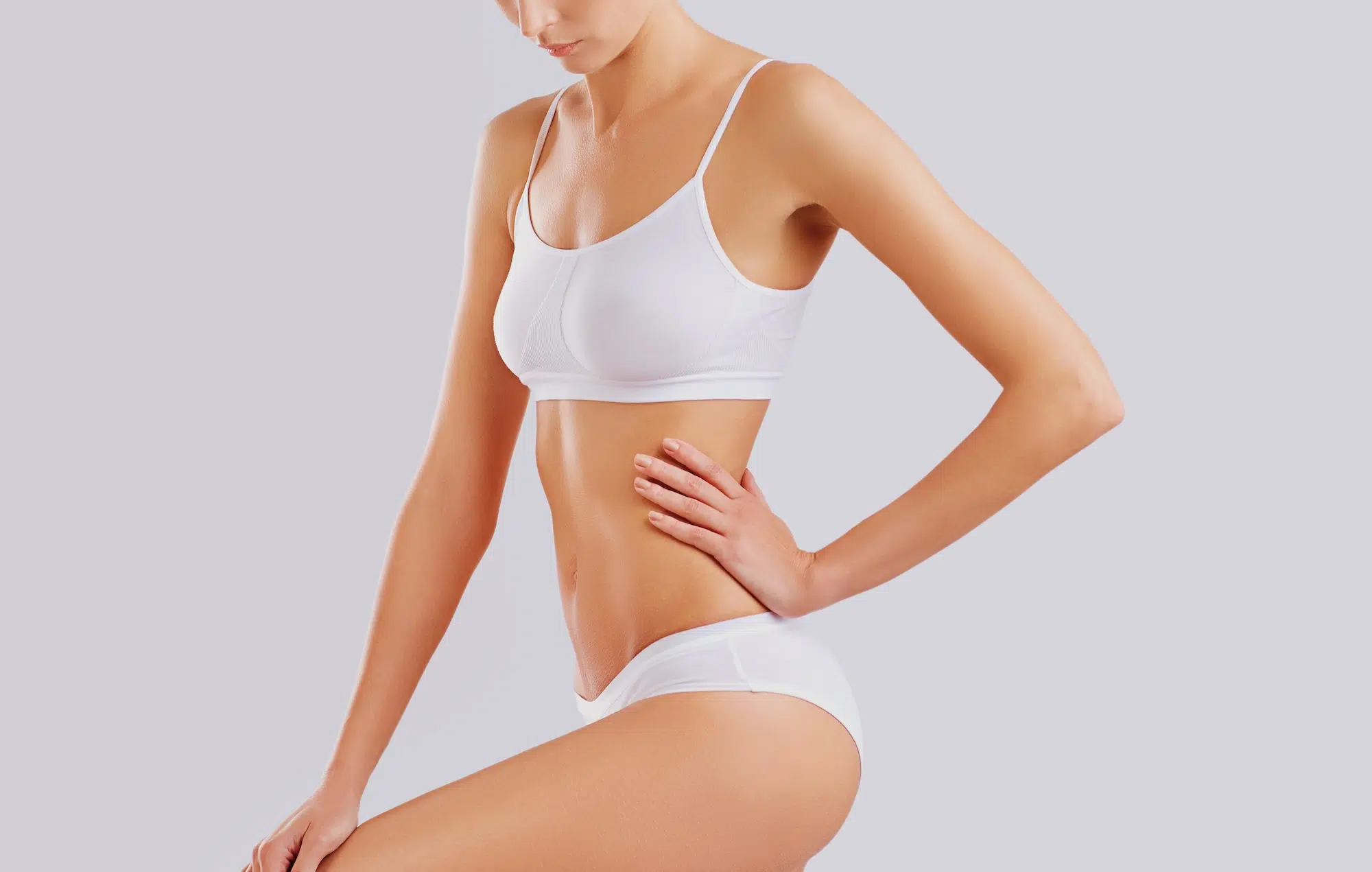 young woman in white bra and underwear